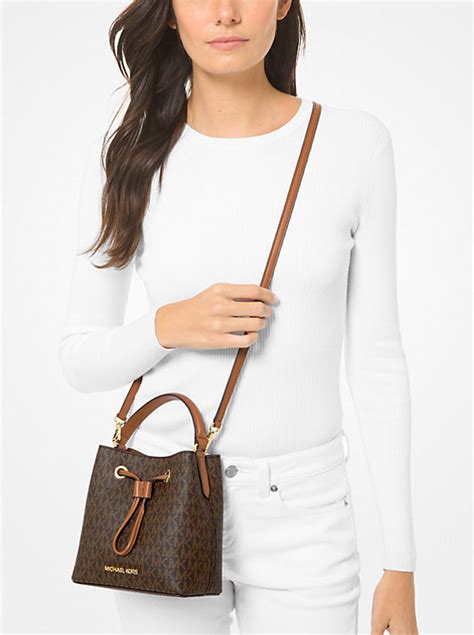 michael kors suri small bucket|Suri Small Logo Perforated Suede Crossbody Bag .